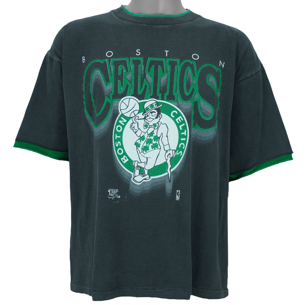 1990s vintage NBA Boston Celtics roll em ups, ringer, spell-out T-Shirt by Official Fan. Black in color with green trim, X-Large in size and is in excellent condition.
