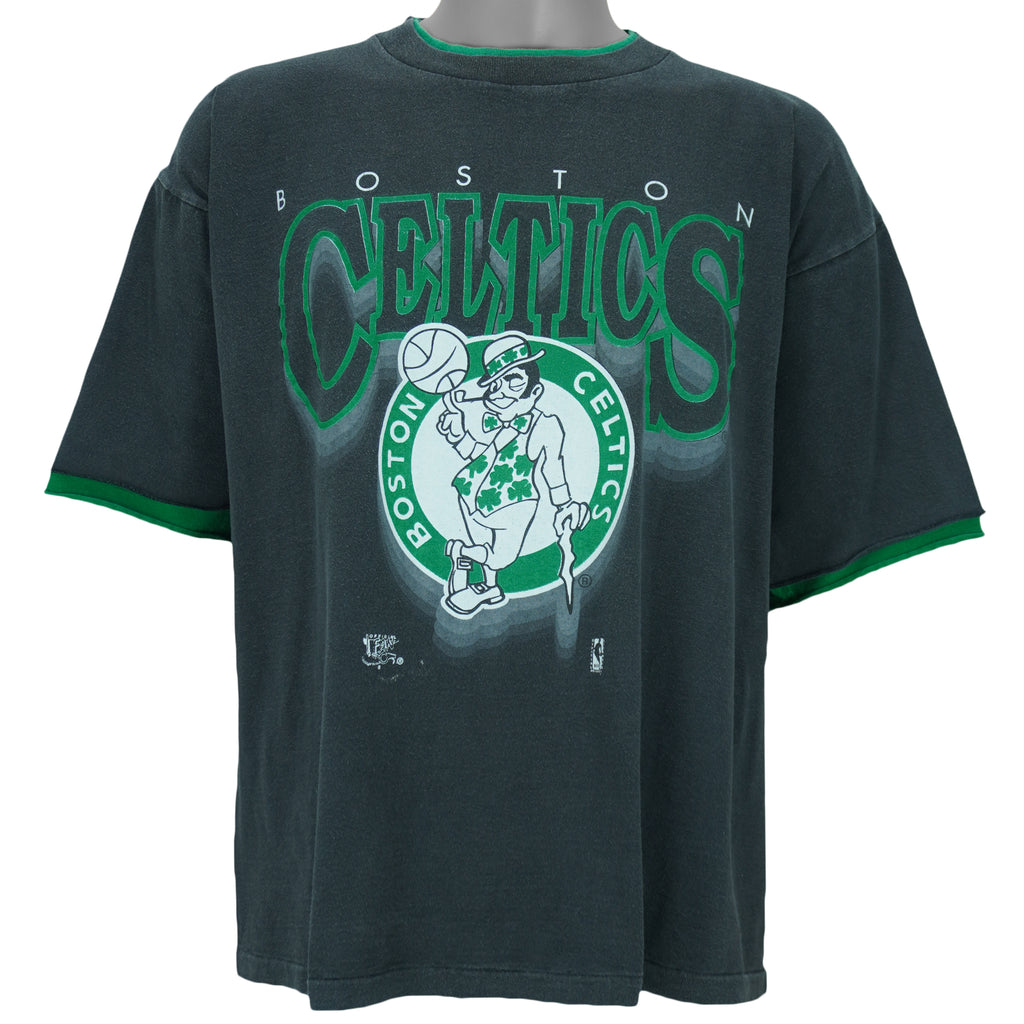 1990s vintage NBA Boston Celtics roll em ups, ringer, spell-out T-Shirt by Official Fan. Black in color with green trim, X-Large in size and is in excellent condition.