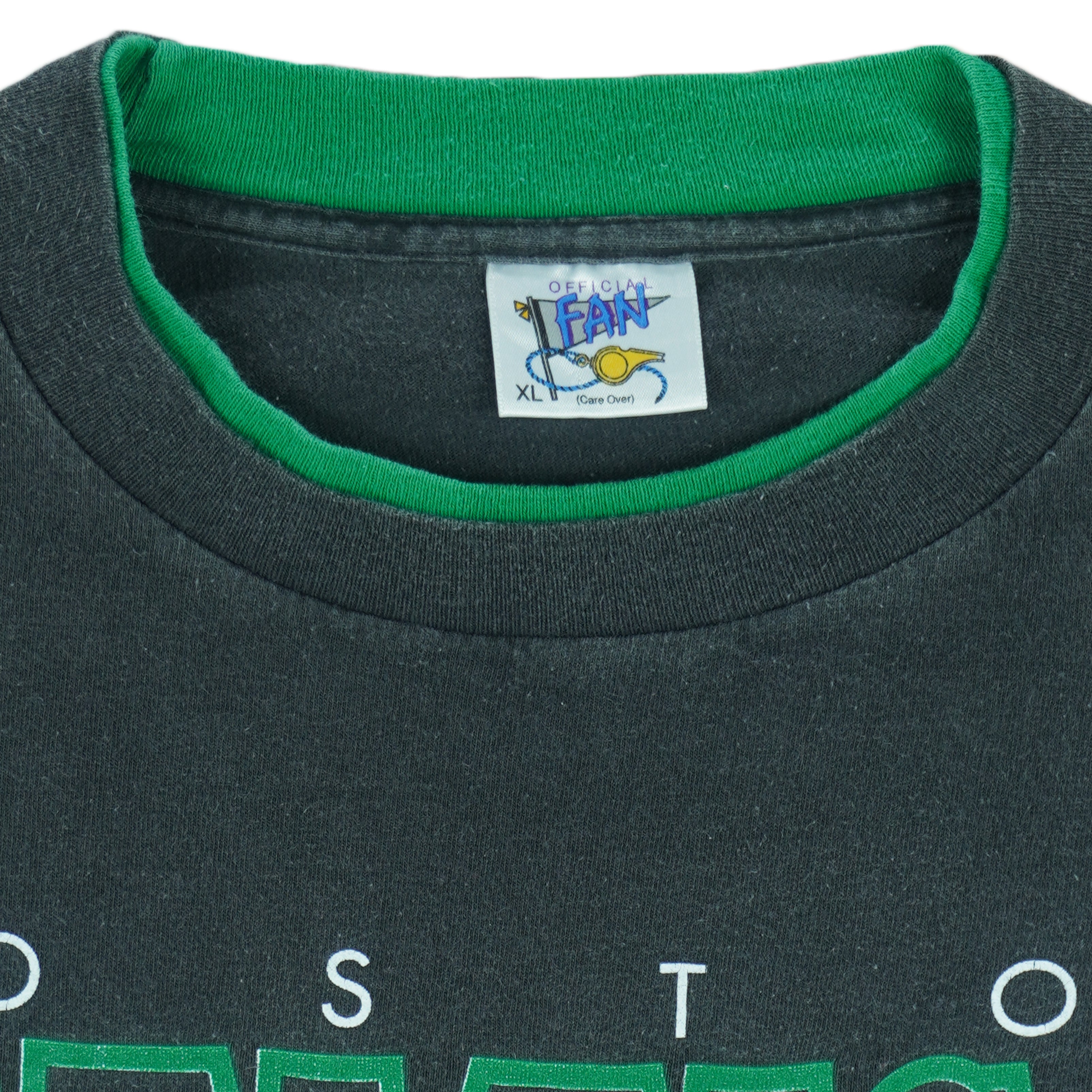 1990s vintage NBA Boston Celtics roll em ups, ringer, spell-out T-Shirt by Official Fan. Black in color with green trim, X-Large in size and is in excellent condition.