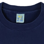1993 vintage MLB Seattle Mariners big spell-out T-Shirt by Competitor. Blue in color, fitting Medium in size and is in excellent condition.