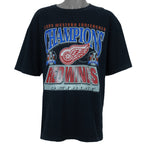 1995 vintage NHL Detroit Red Wings Western Conference Champions T-Shirt. Black in color with big spell-out and logo on front, fitting X-Large in size and is in excellent condition.