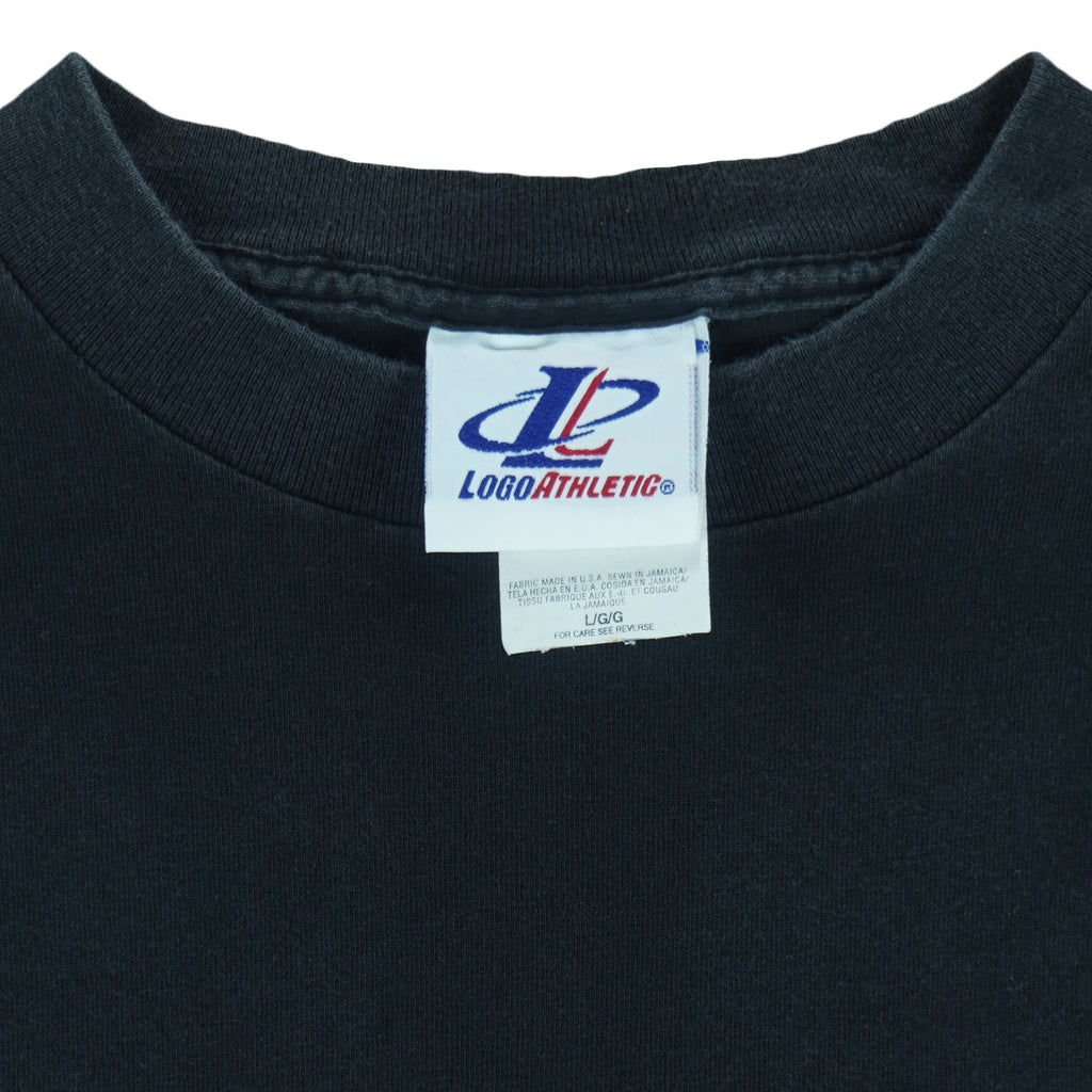 1990s vintage NFL Pittsburgh Steelers embroidered T-Shirt by Logo Athletic. Black in color with patch above right breast and on left sleeve, fits X-Large and is in excellent condition.