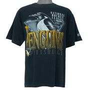 1993 vintage NHL Pittsburgh Penguins T-Shirt by Logo Athletic. Black in color with big spell-out and big chrome-style logo graphic on front, Large in size and is in excellent condition.