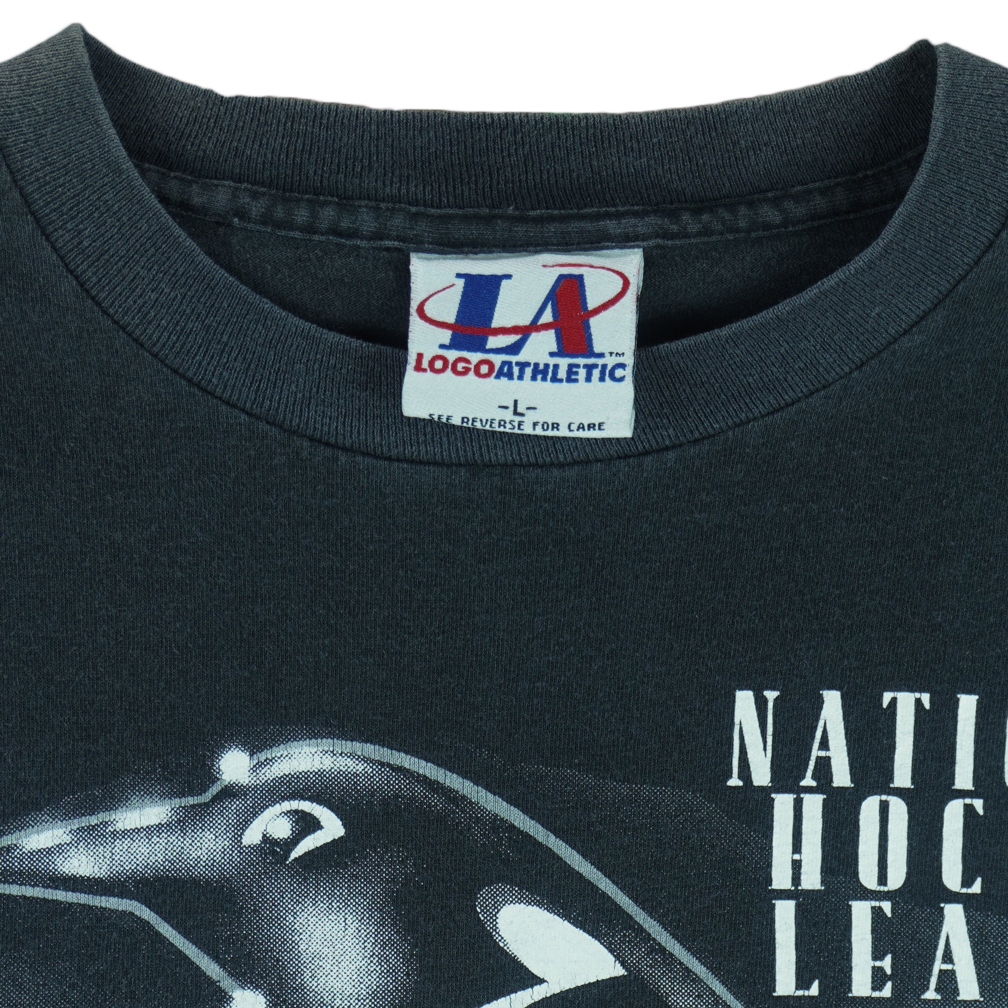 1993 vintage NHL Pittsburgh Penguins T-Shirt by Logo Athletic. Black in color with big spell-out and big chrome-style logo graphic on front, Large in size and is in excellent condition.