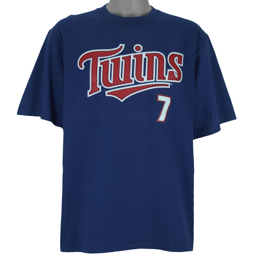 2005 vintage MLB Minnesota Twins Joe Mauer T-Shirt by Lee Sport. Blue in color with sew-on patch logos on front and back, autograph on #7, fits Large in size and is in excellent condition.