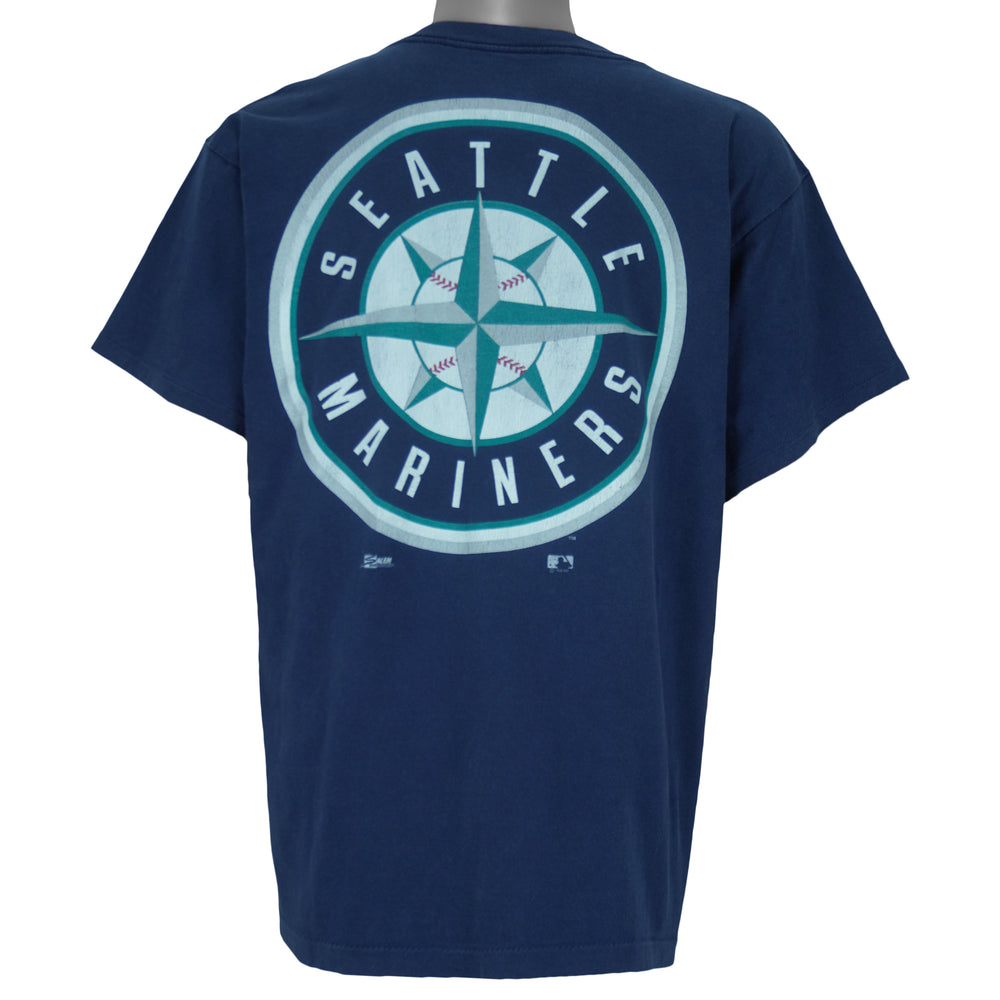 1998 or 99 vintage MLB Seattle Mariners T-Shirt by Salem Sportswear. Dark blue in color with big spell-out on front, big logo on back and small logo on left sleeve, X-Large in size and is in excellent condition.