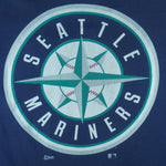 1998 or 99 vintage MLB Seattle Mariners T-Shirt by Salem Sportswear. Dark blue in color with big spell-out on front, big logo on back and small logo on left sleeve, X-Large in size and is in excellent condition.