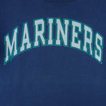 1998 or 99 vintage MLB Seattle Mariners T-Shirt by Salem Sportswear. Dark blue in color with big spell-out on front, big logo on back and small logo on left sleeve, X-Large in size and is in excellent condition.