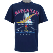 1996 vintage Atlanta Olympic Games Yachting T-Shirt by Hanes. Blue in color with "Site of 1996 Olympic Yachting Events" and "Savannah" spell-outs, Large in size and is in excellent condition.