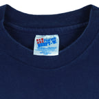 1996 vintage Atlanta Olympic Games Yachting T-Shirt by Hanes. Blue in color with "Site of 1996 Olympic Yachting Events" and "Savannah" spell-outs, Large in size and is in excellent condition.