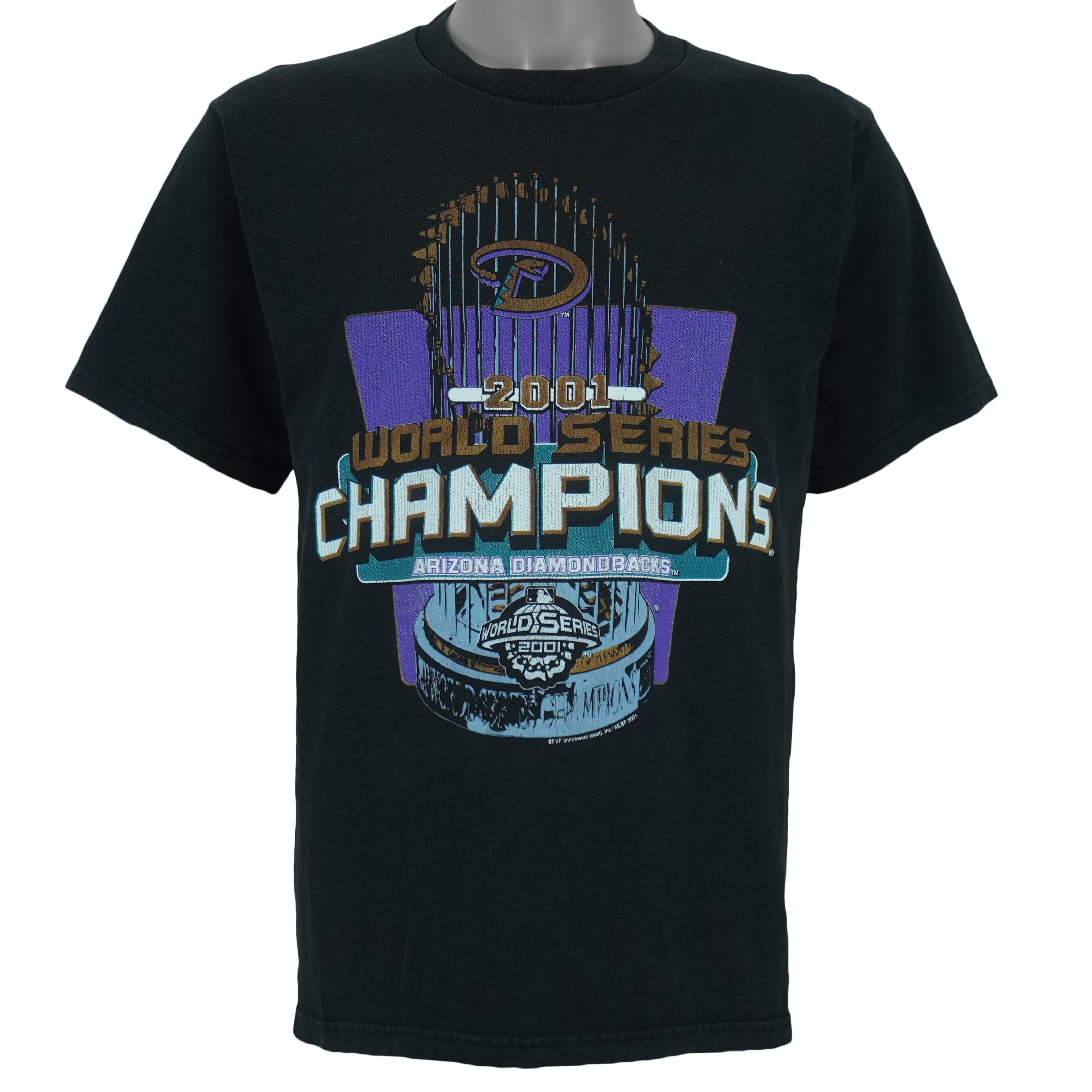 2001 vintage MLB Arizona Diamondbacks World Series Champions T-Shirt by Lee Sport. Black in color with spell-out and trophy graphic by Imagewear on front. Medium in size and is in excellent condition.