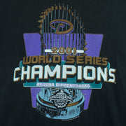2001 vintage MLB Arizona Diamondbacks World Series Champions T-Shirt by Lee Sport. Black in color with spell-out and trophy graphic by Imagewear on front. Medium in size and is in excellent condition.
