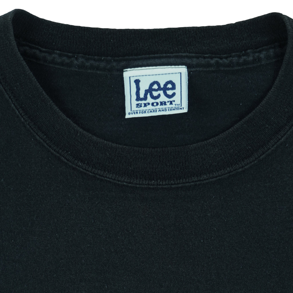 1990s vintage MLB Chicago White Sox spell-out T-Shirt by Lee Sport. Black in color, fits Large in size and is in very good condition.
