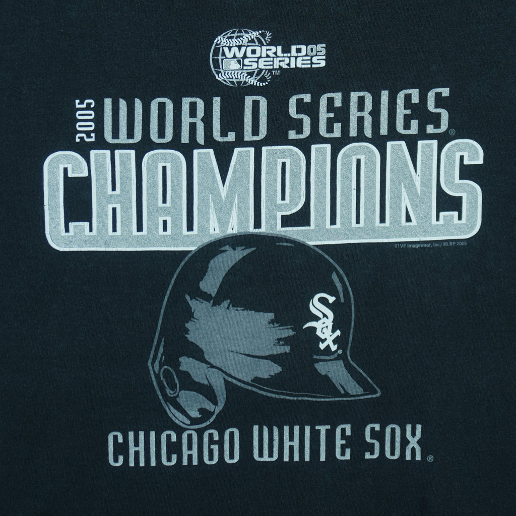 2005 vintage MLB Chicago White Sox World Series Champions spell-out T-Shirt by CSA. Black in color with helmet and team logo on front, Medium in size and is in excellent condition.