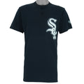 1990s vintage MLB Chicago White Sox button-collar T-Shirt by Majestic - Genuine Merchandise. Black in color with big logo on front, #10 on back, Majestic logo on right sleeve and Qdoba Mexican Grill logo on left sleeve, medium in size and is in very good condition.