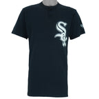 1990s vintage MLB Chicago White Sox button-collar T-Shirt by Majestic - Genuine Merchandise. Black in color with big logo on front, #10 on back, Majestic logo on right sleeve and Qdoba Mexican Grill logo on left sleeve, medium in size and is in very good condition.