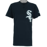1990s vintage MLB Chicago White Sox button-collar T-Shirt by Majestic - Genuine Merchandise. Black in color with big logo on front, #10 on back, Majestic logo on right sleeve and Qdoba Mexican Grill logo on left sleeve, medium in size and is in very good condition.