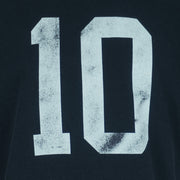 1990s vintage MLB Chicago White Sox button-collar T-Shirt by Majestic - Genuine Merchandise. Black in color with big logo on front, #10 on back, Majestic logo on right sleeve and Qdoba Mexican Grill logo on left sleeve, medium in size and is in very good condition.