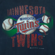 1991 vintage MLB Minnesota Twins spell-out T-Shirt by Bulletin Athletic. Blue in color with grunge lettering and baseball print on front, Medium in size and is in excellent condition.