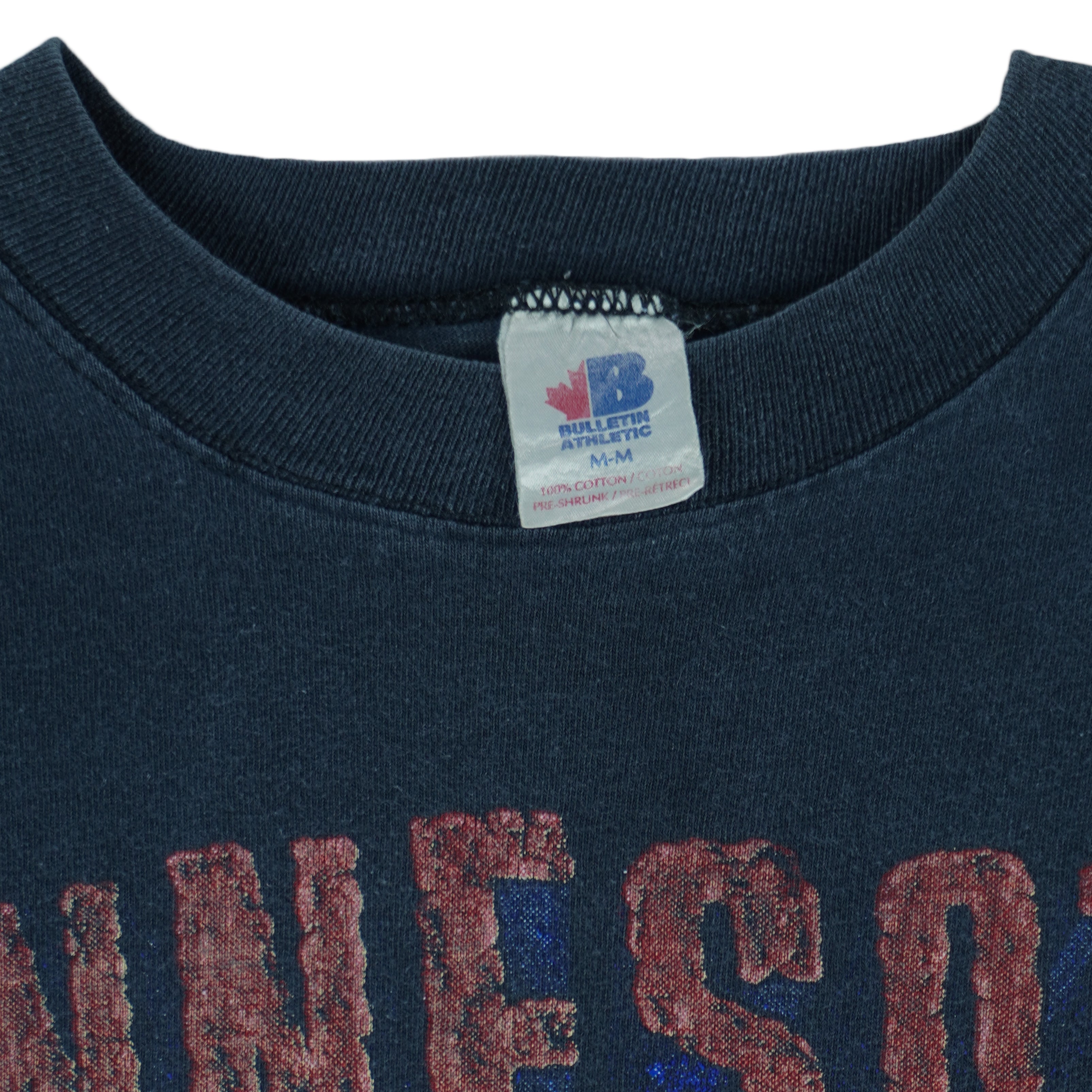 1991 vintage MLB Minnesota Twins spell-out T-Shirt by Bulletin Athletic. Blue in color with grunge lettering and baseball print on front, Medium in size and is in excellent condition.
