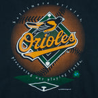 1996 vintage MLB Baltimore Orioles big-logo recycled material T-Shirt by Underground Athletic. Black in color with "Preserving our playing fields" text on front, XX-Large in size and is in excellent condition.