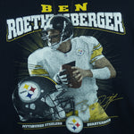 2000s vintage NFL Pittsburgh Steelers quarterback Ben Roethlisberger T-Shirt by NFLPlayers. Black in color with player image, signature and helmet graphic on front, fits Medium in size and is in excellent condition.