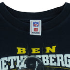 2000s vintage NFL Pittsburgh Steelers quarterback Ben Roethlisberger T-Shirt by NFLPlayers. Black in color with player image, signature and helmet graphic on front, fits Medium in size and is in excellent condition.