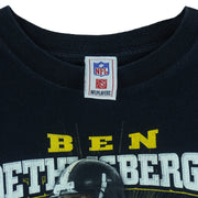 2000s vintage NFL Pittsburgh Steelers quarterback Ben Roethlisberger T-Shirt by NFLPlayers. Black in color with player image, signature and helmet graphic on front, fits Medium in size and is in excellent condition.