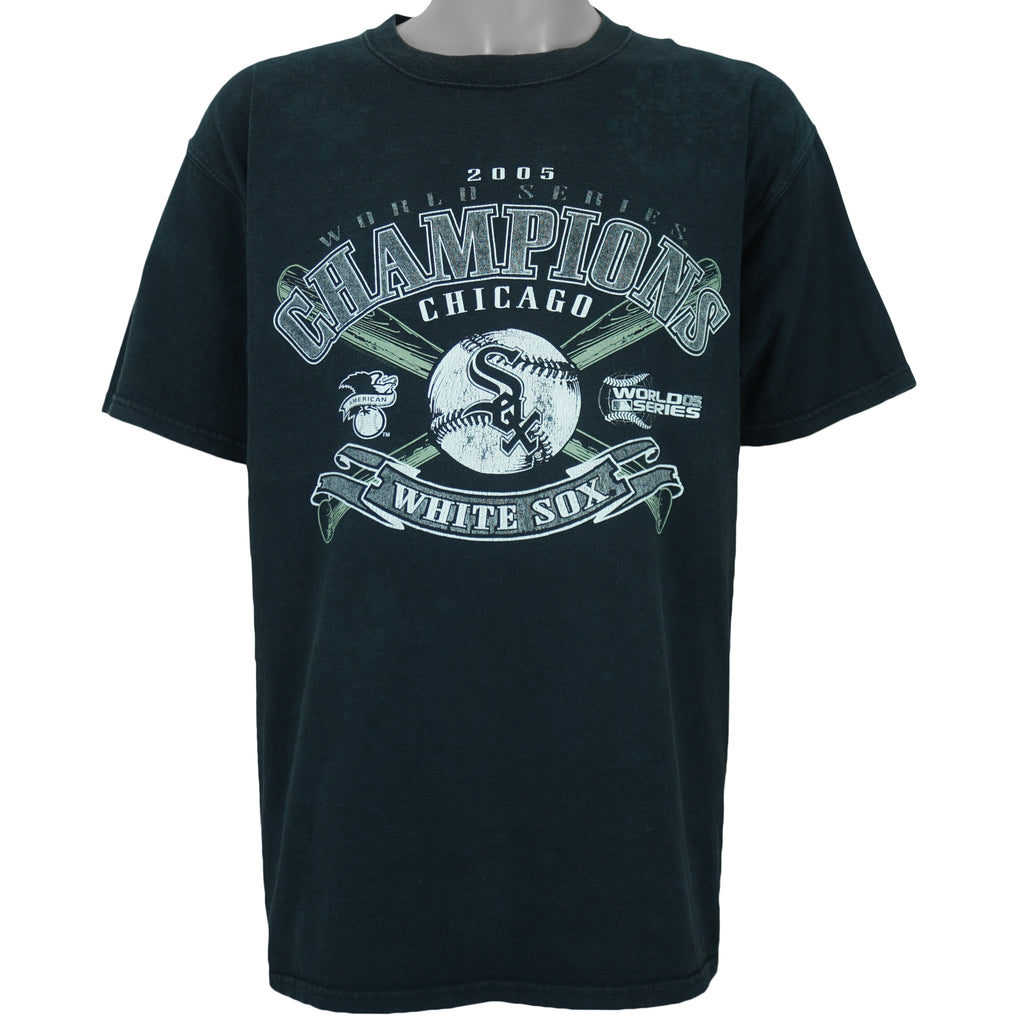 2005 vintage MLB Chicago White Sox World Series Champions spell-out T-Shirt by CSA. Black in color with crossed baseball bats and and team logo on front, Large in size and is in excellent condition.