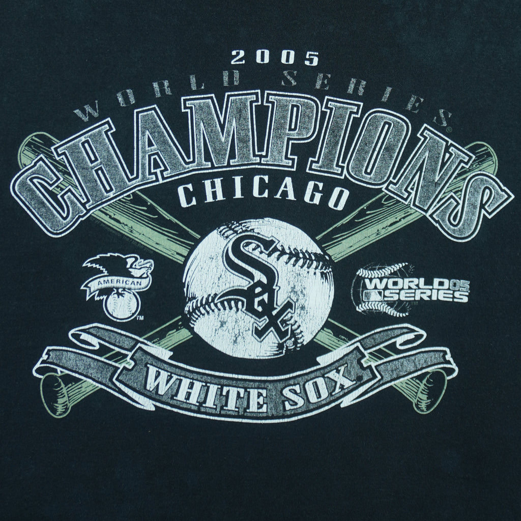 2005 vintage MLB Chicago White Sox World Series Champions spell-out T-Shirt by CSA. Black in color with crossed baseball bats and and team logo on front, Large in size and is in excellent condition.