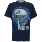 2000s vintage NCAA University of Arizona Wildcats football helmet T-Shirt. Dark blue in color with "Absolute Victory" spell-out on front and "We Came, We Saw, We Kicked Butt" on back. Fits Medium in size and in excellent condition.