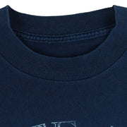 2000s vintage NCAA University of Arizona Wildcats football helmet T-Shirt. Dark blue in color with "Absolute Victory" spell-out on front and "We Came, We Saw, We Kicked Butt" on back. Fits Medium in size and in excellent condition.