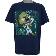 1990s vintage NCAA University of Notre Dame Fighting Irish helmet T-Shirt by Logo 7. Blue in color, X-Large in size and is in excellent condition.