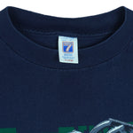 1990s vintage NCAA University of Notre Dame Fighting Irish helmet T-Shirt by Logo 7. Blue in color, X-Large in size and is in excellent condition.