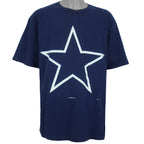 1995 vintage NFL Dallas Cowboys T-shirt by Logo 7. Dark blue in color with large star logo on front, fits X-Large in size and in excellent condition.
