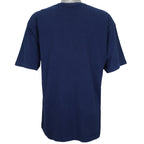 1995 vintage NFL Dallas Cowboys T-shirt by Logo 7. Dark blue in color with large star logo on front, fits X-Large in size and in excellent condition.