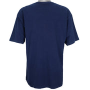 1995 vintage NFL Dallas Cowboys T-shirt by Logo 7. Dark blue in color with large star logo on front, fits X-Large in size and in excellent condition.