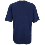 1995 vintage NFL Dallas Cowboys T-shirt by Logo 7. Dark blue in color with large star logo on front, fits X-Large in size and in excellent condition.