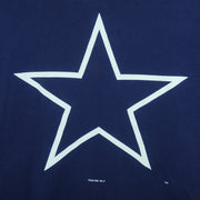 1995 vintage NFL Dallas Cowboys T-shirt by Logo 7. Dark blue in color with large star logo on front, fits X-Large in size and in excellent condition.