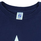 1995 vintage NFL Dallas Cowboys T-shirt by Logo 7. Dark blue in color with large star logo on front, fits X-Large in size and in excellent condition.