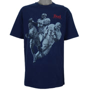 1990s vintage Budweiser single stitch T-Shirt by Hanes Beefy-T. Blue in color with three players and "Bud, King of Beers" small spell-out on front, X-Large in size and is in excellent condition.