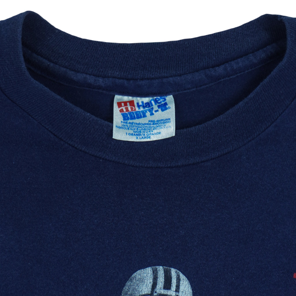 1990s vintage Budweiser single stitch T-Shirt by Hanes Beefy-T. Blue in color with three players and "Bud, King of Beers" small spell-out on front, X-Large in size and is in excellent condition.