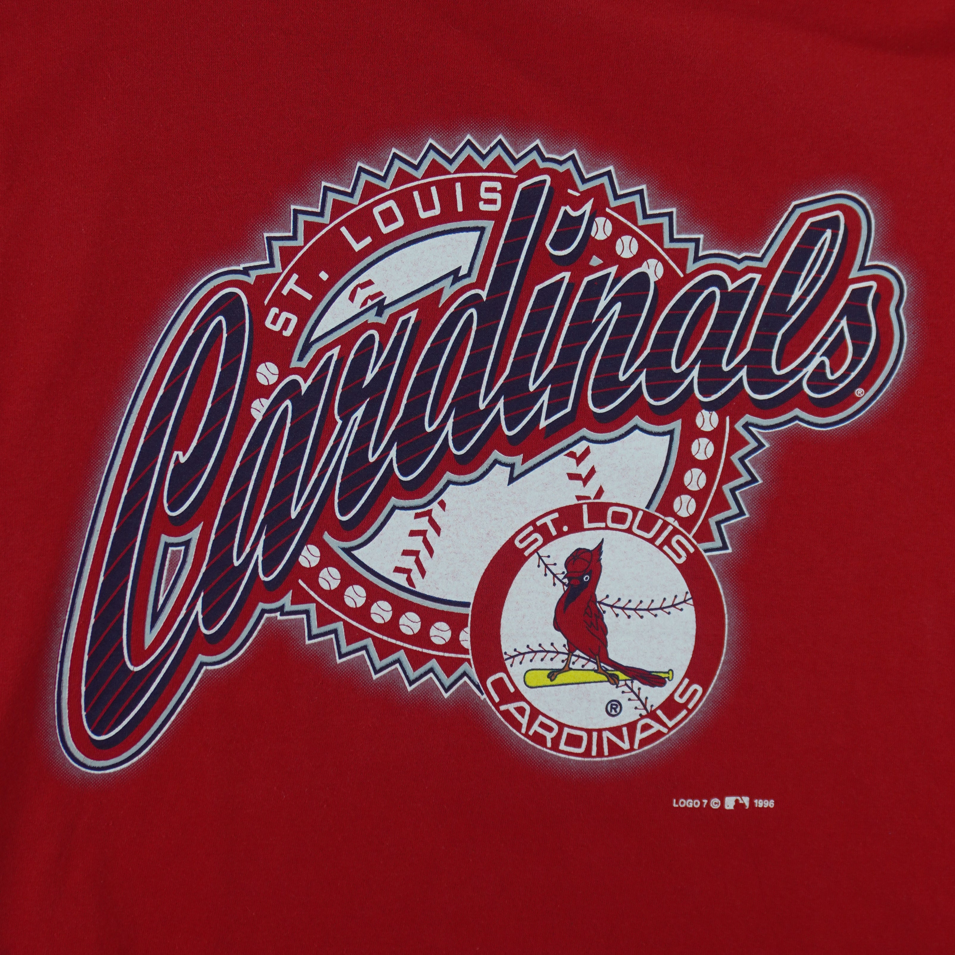 1996 vintage MLB St. Louis Cardinals spell-out T-Shirt by Logo 7. Red in color with cursive team name and small logo on front, Medium in size and is in excellent condition.