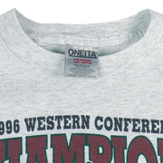 1996 vintage NBA Seattle Supersonics Western Conference Champs T-Shirt by Oneita. White in color with big spell-out and logo. X-Large in size and is in excellent condition.