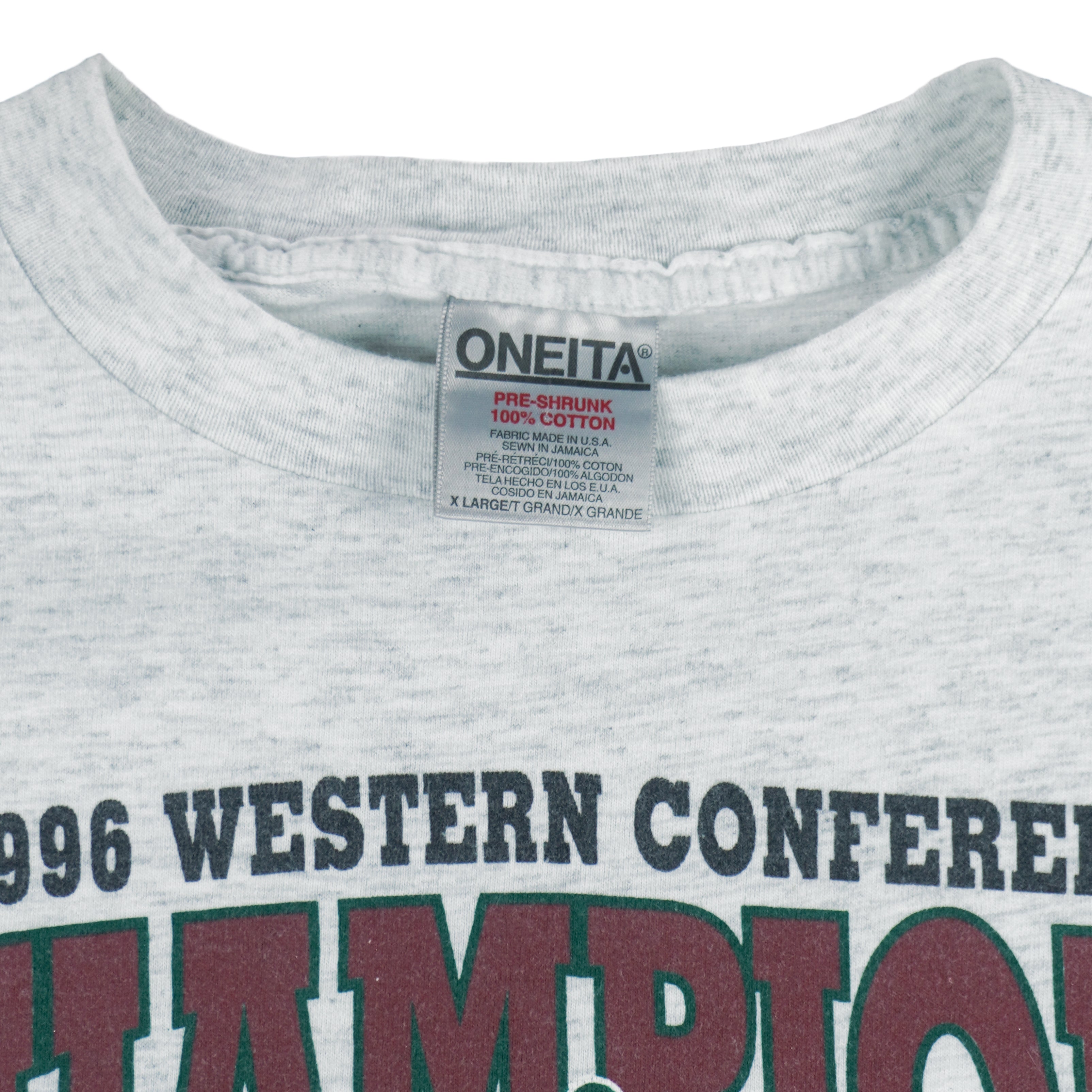 1996 vintage NBA Seattle Supersonics Western Conference Champs T-Shirt by Oneita. White in color with big spell-out and logo. X-Large in size and is in excellent condition.