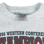 1996 vintage NBA Seattle Supersonics Western Conference Champs T-Shirt by Oneita. White in color with big spell-out and logo. X-Large in size and is in excellent condition.