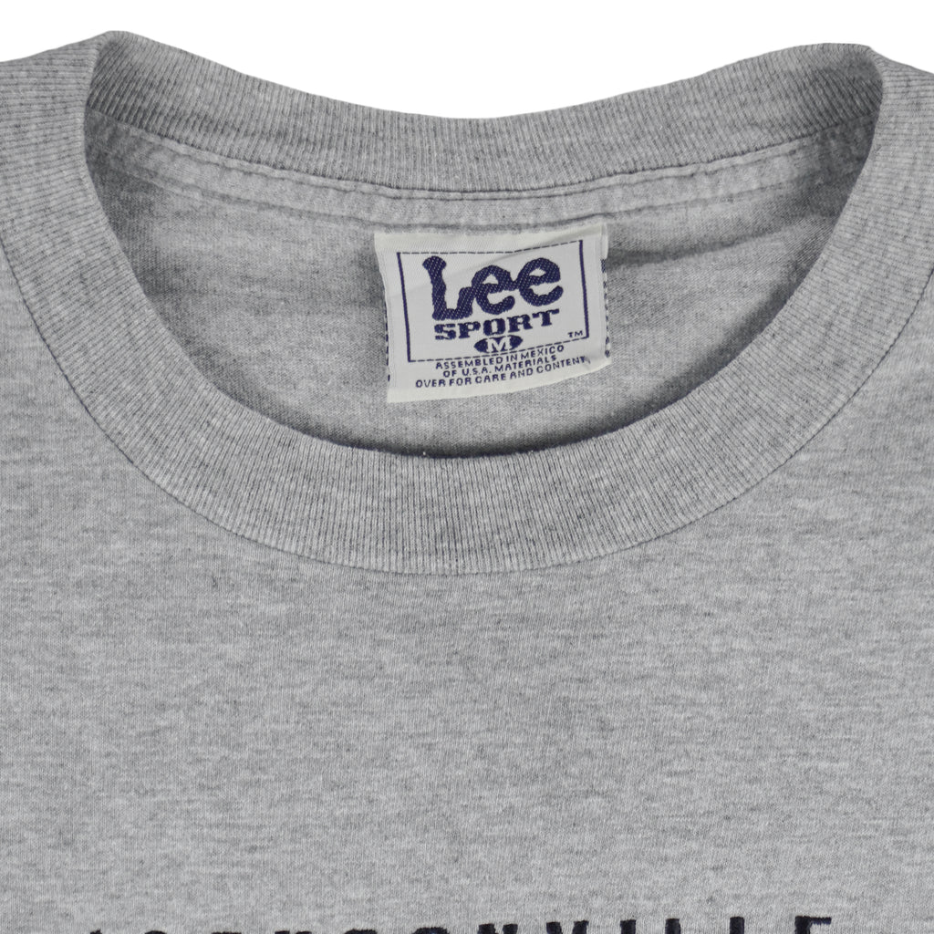 NFL (Lee) - Jacksonville Jaguars Embroidered Logo T-Shirt 1990s Medium Vintage Retro Basketball