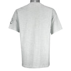 1993 vintage Prudhoe Bay 13th Annual Marathon T-Shirt by Hanes. Light grey in color with animal cartoon printed graphic on front, tagged size Large and is in excellent condition.