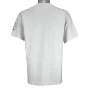 1993 vintage Prudhoe Bay 13th Annual Marathon T-Shirt by Hanes. Light grey in color with animal cartoon printed graphic on front, tagged size Large and is in excellent condition.