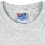 1993 vintage Prudhoe Bay 13th Annual Marathon T-Shirt by Hanes. Light grey in color with animal cartoon printed graphic on front, tagged size Large and is in excellent condition.